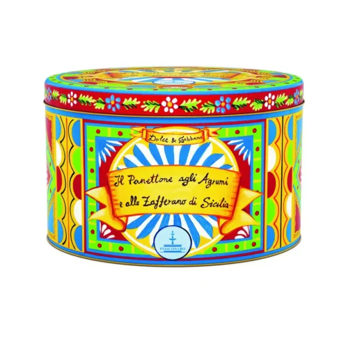 panettone fiasconaro dolce e gabbana in latta tonda, decorata con colori molto accessi come il verde, azzurro, rosso, giallo. Penttone agli agrumi e zafferano 1 kg